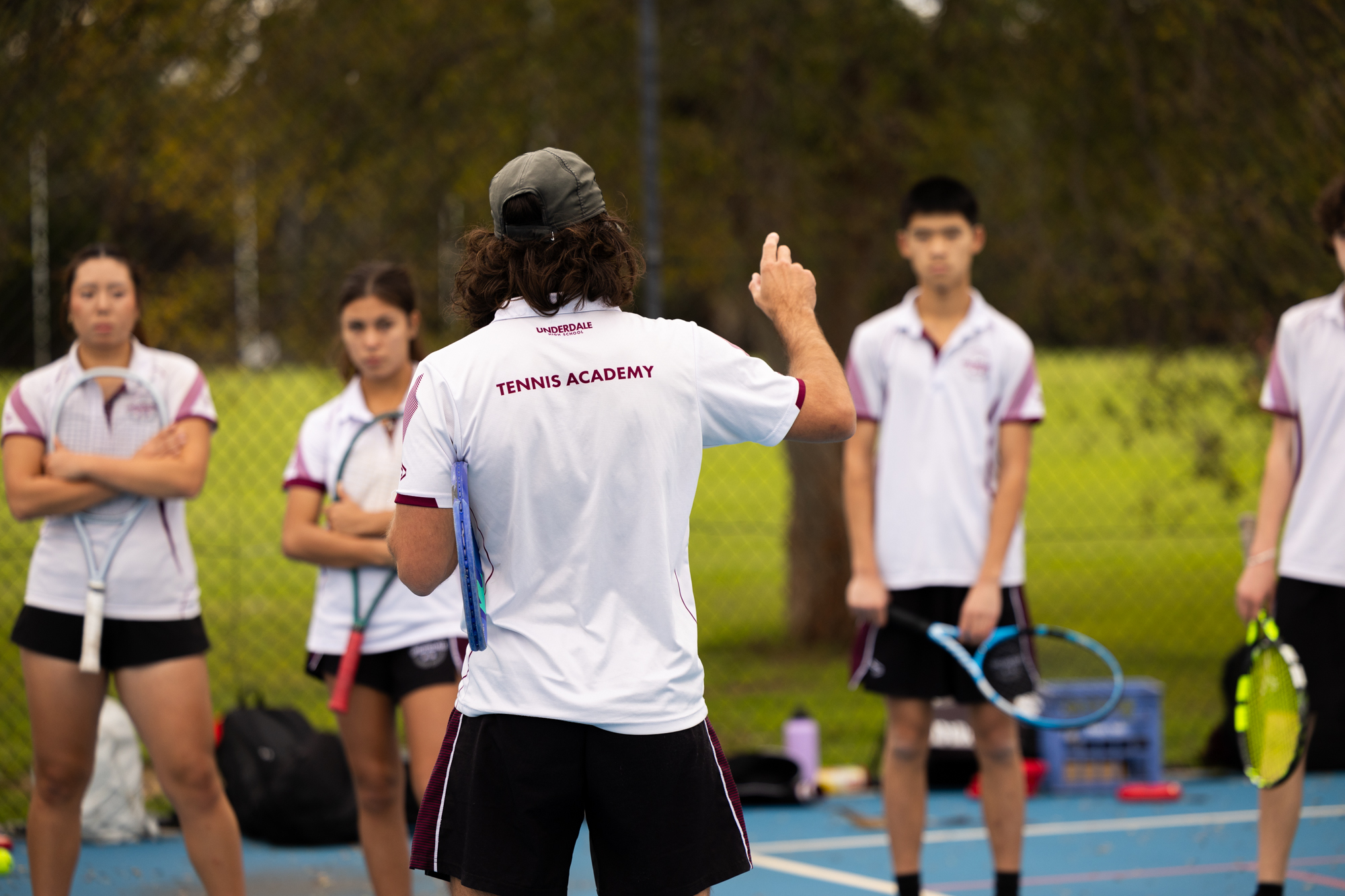 UNDERDALEHS-325 Underdale High School Tennis Academy students on court